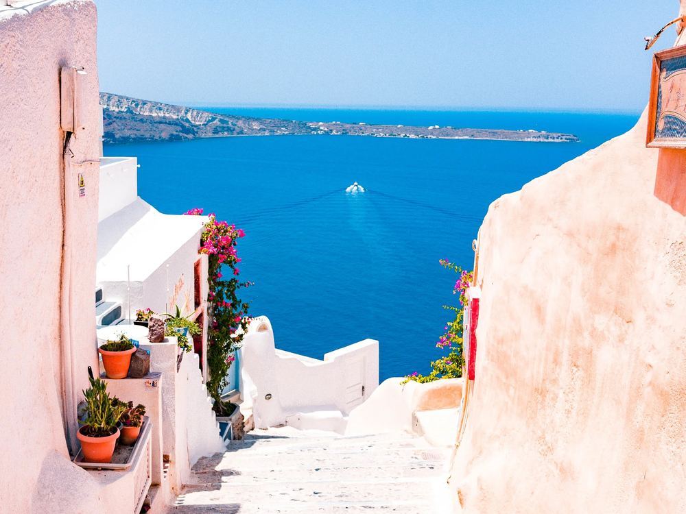 Whitewashed Greek village by the sea
