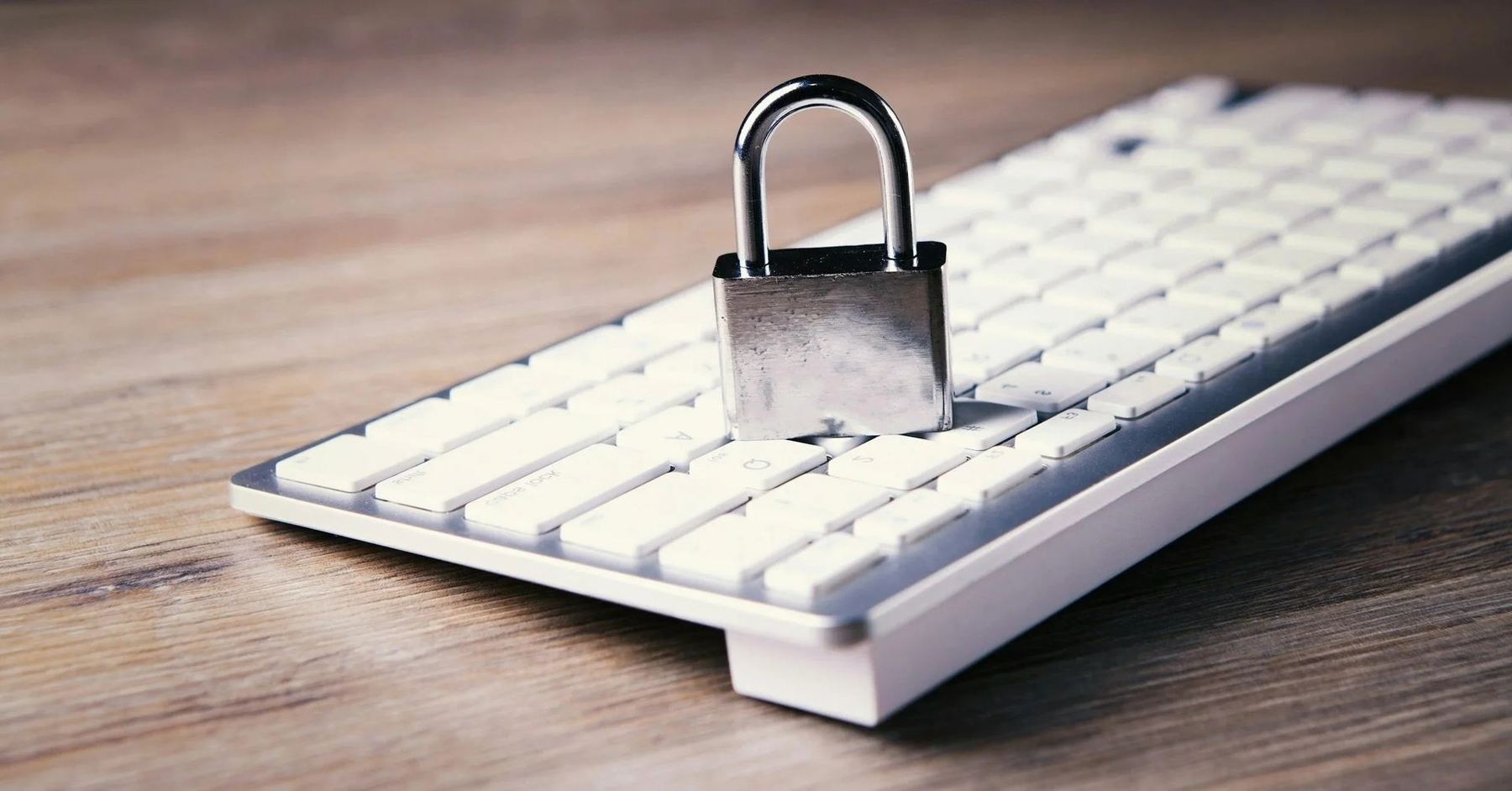 A padlock resting on a keyboard